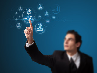 Businessman pressing virtual promotion and shipping type of icon