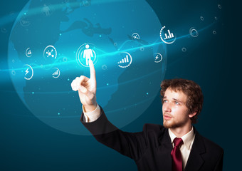 Businessman pressing modern social type of icons