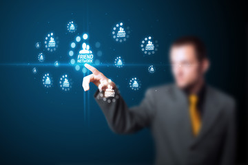 Businessman pressing modern social type of icons