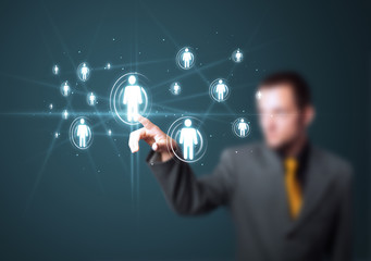 Businessman pressing modern social type of icons