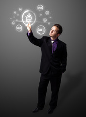 Businessman pressing virtual promotion and shipping type of icon