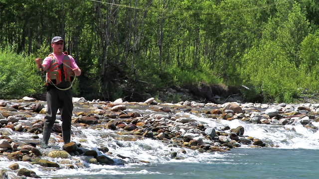 The fisherman and fly fishing