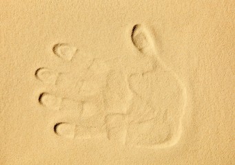 Handprint in the sand