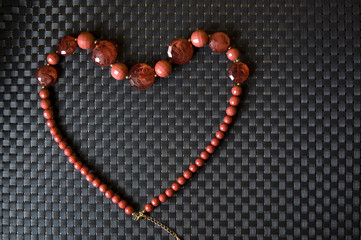 red necklace in heart shape