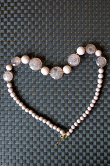 pink necklace in heart shape