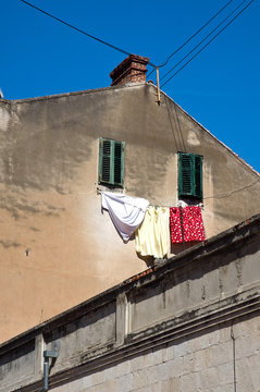 Put underwear out from windows to dry