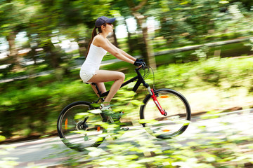 Naklejka premium Girl cycling