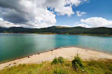 Dam Lake Bolboci in Bucegi mountains, Romania