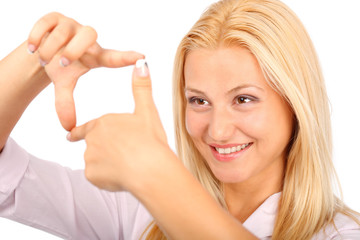 Fototapeta premium Beautiful girl framing with her fingers
