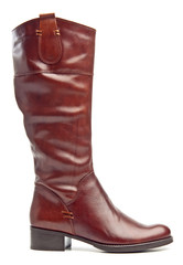Red female knee high boot over white