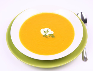 Pumpkin Soup decorated with cream and parsley