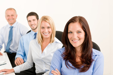 Fototapeta premium Business team happy sit in line behind table