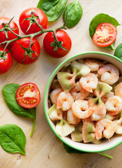 Delicious multicolored pasta with shrimps