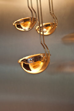 shiny copper ladles