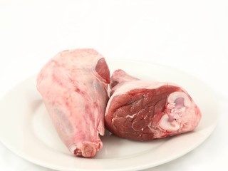 Fresh red meat, chops isolated on white plate