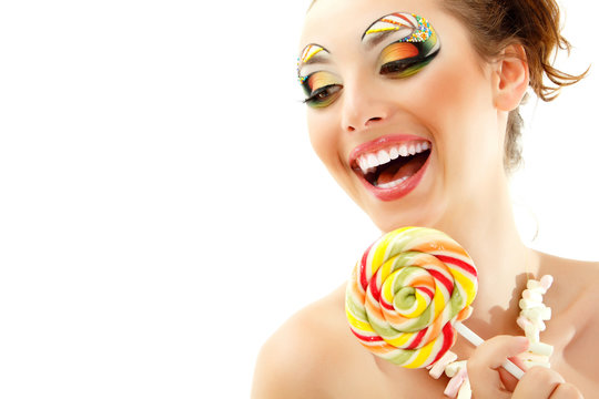 Woman Laughing With Candy And Beautiful Make-up Young Attractive