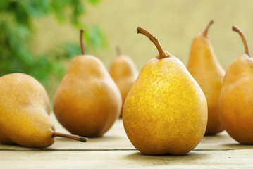 pears on wooden table