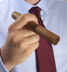 Hand with a cigar