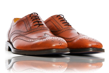 Fashion concept with male shoes on white