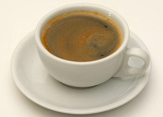 One cup of coffee and saucer.