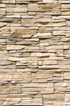 Stacked stone wall background vertical