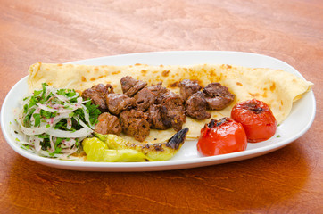 Kebab served in the plate