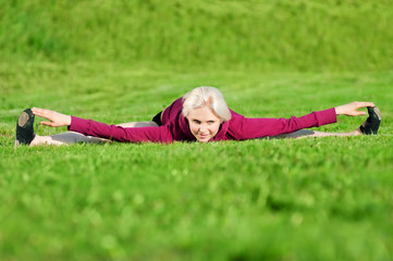 Beautiful woman doing yoga stretching exercise