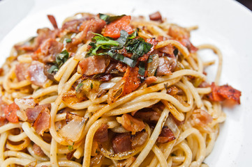 tasty pasta with roast ham on the table