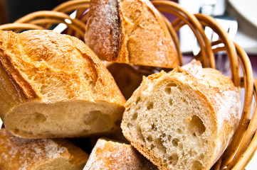 bread in basket - little roll breads in basket on table