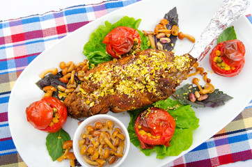 Lamb leg served in the plate