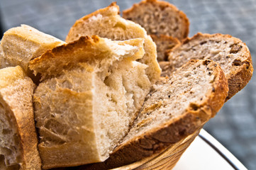 bread in basket - little roll breads in basket on table