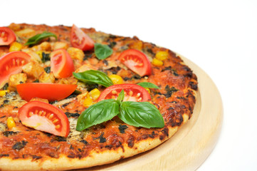Pizza with ham and tomatoes
