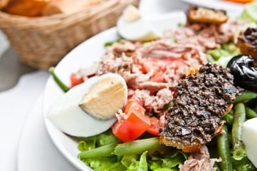 Fresh salmon salad with tomatoes