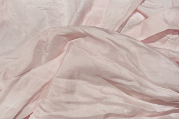 Satin cloth as background.