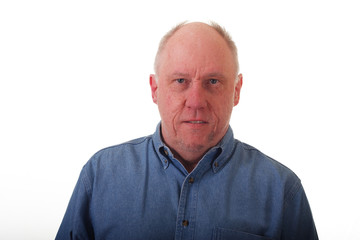 Obraz premium Older Man in Blue Denim Shirt