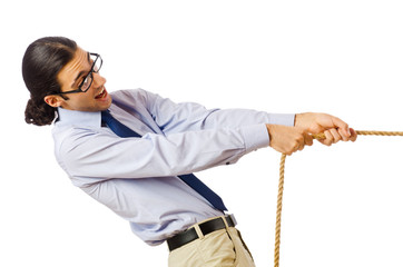 Businessman in tug of war concept