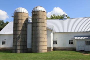 Twin silos on a working farm in the Midwest