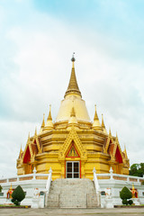 Fototapeta na wymiar Golden Church at Wang ma now Temple at Ratchaburi,Thailand
