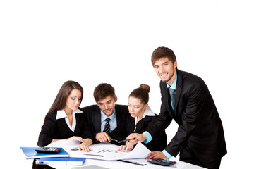 young business people sitting at desk working