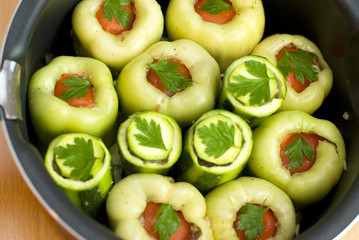pan with stuffed peppers and zucchini