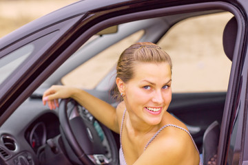 Fototapeta na wymiar Beautiful Girl Portrait with Her New Vehicle