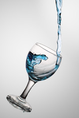 Water flows in a glass