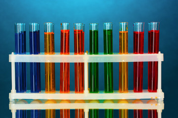 Obraz premium test tubes in a laboratory on a blue background