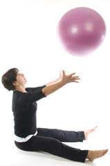 woman using core training fitness ball exercising