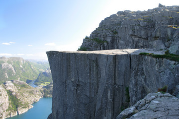 Preikestolen - famous cliff at the norwegian mountains. - obrazy, fototapety, plakaty
