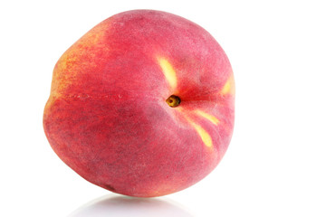 Ripe peach isolated on white