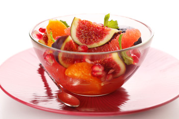Fresh salad with figs, grapefruit, tangerine and pomegranate