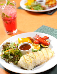 Fish steak with vegetables