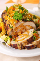 Stuffed pork roast with dried apricots and nuts