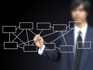 Businessman write diagram